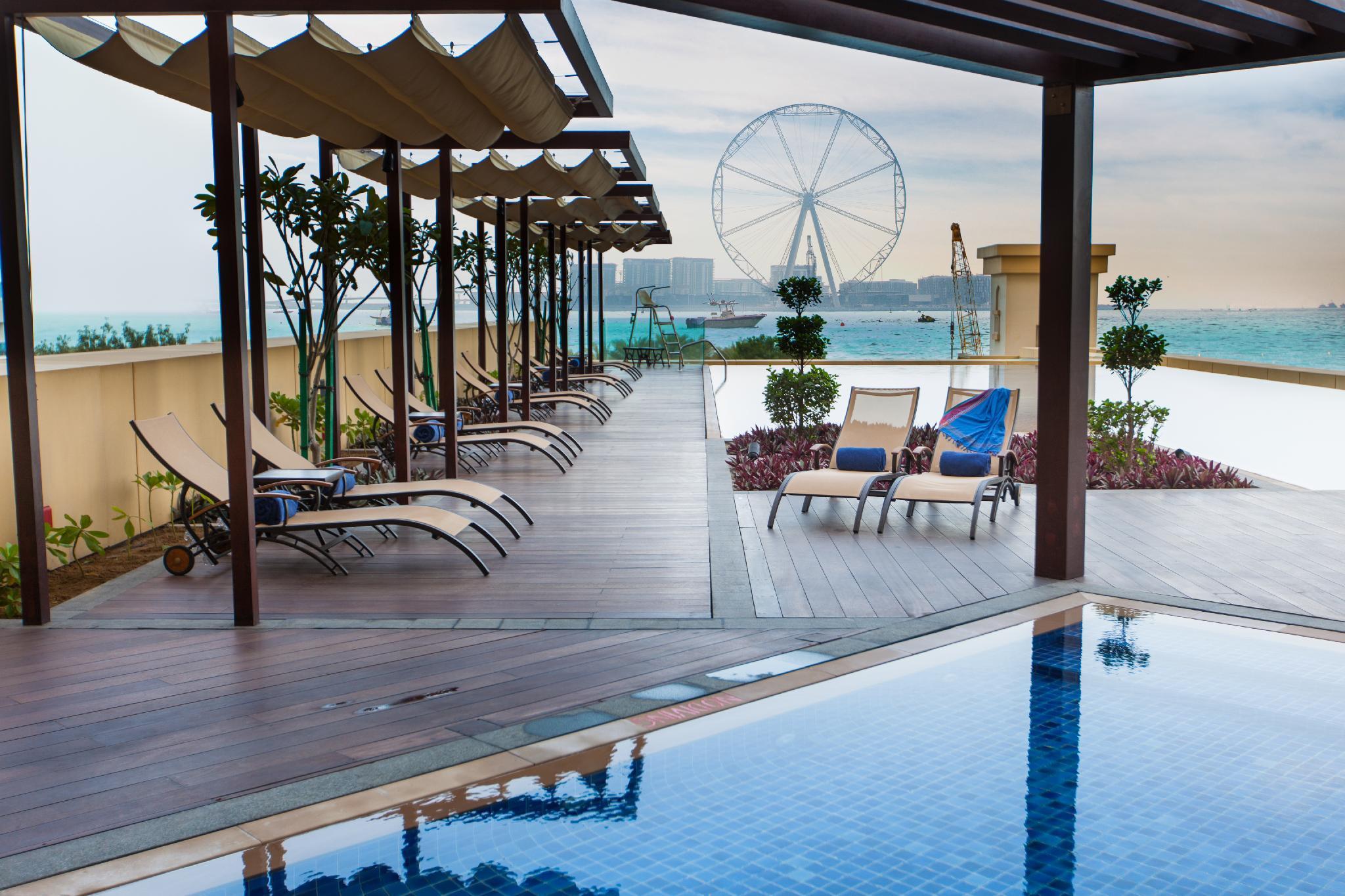 Ja Ocean View Hotel, Jumeirah Beach Dubai Esterno foto The swimming pool at the hotel