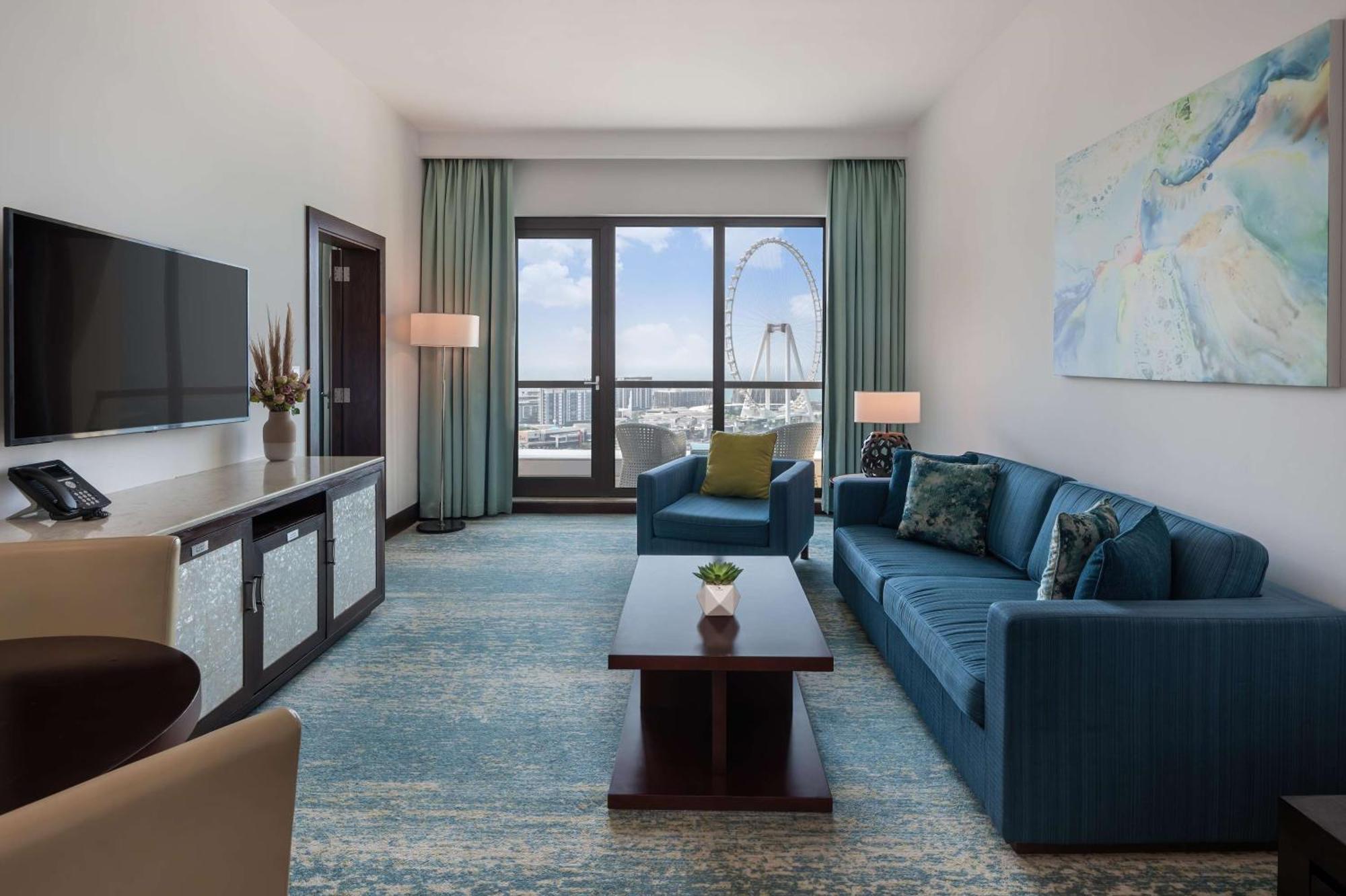 Ja Ocean View Hotel, Jumeirah Beach Dubai Esterno foto A living room at the Four Seasons