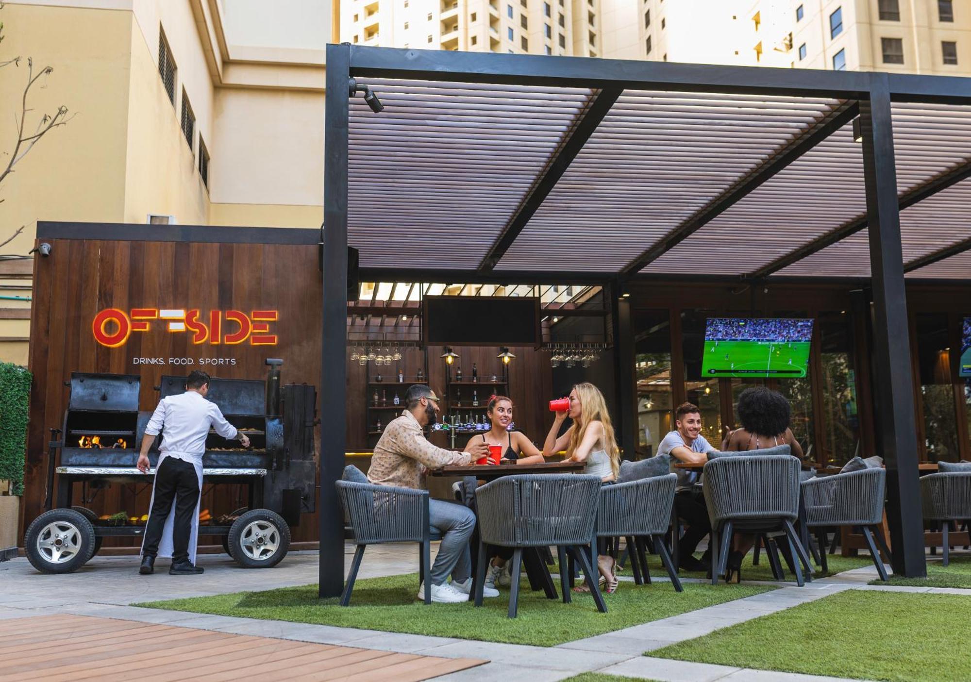 Ja Ocean View Hotel, Jumeirah Beach Dubai Esterno foto Off-side Sports Bar